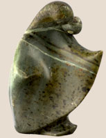 soapstone sculpture of mother and child